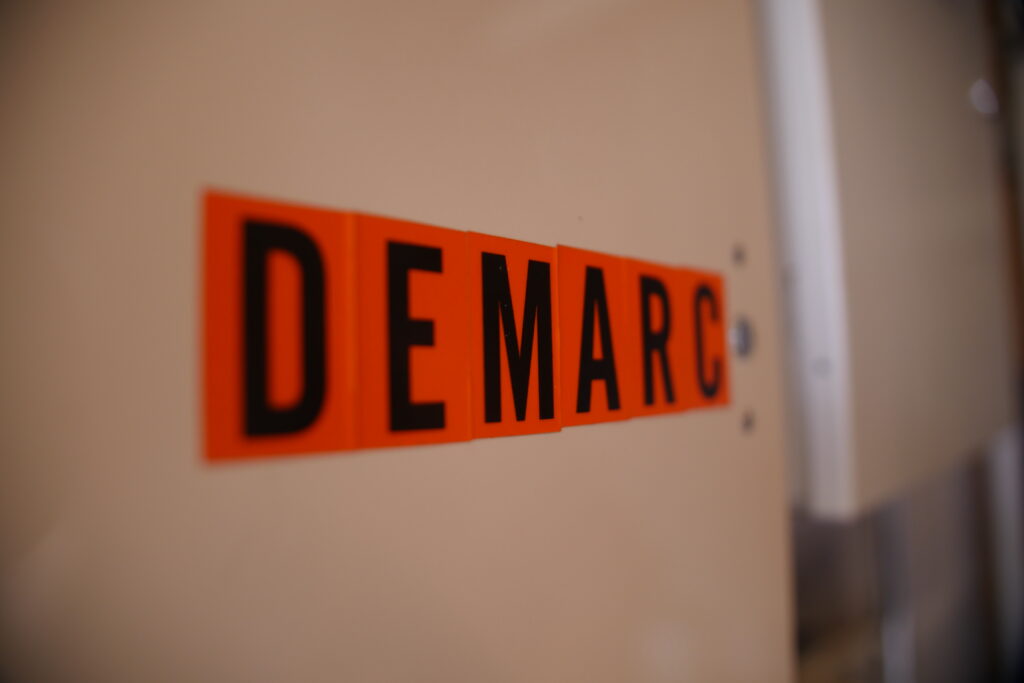 Demarc signage